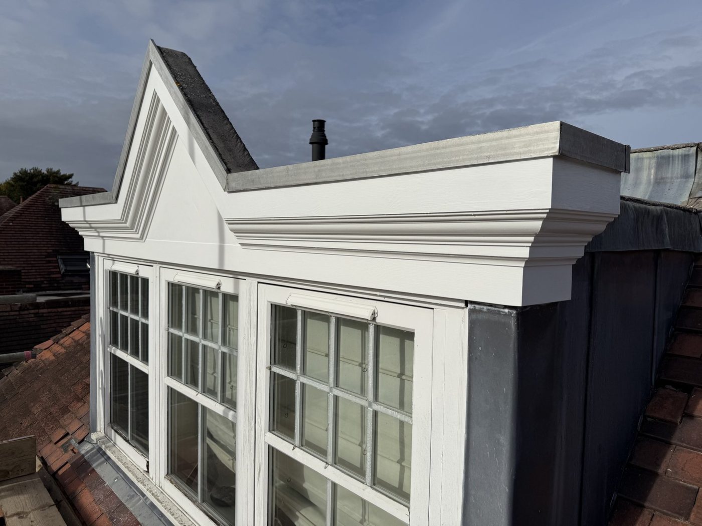 Restored dormer window and painted pediment by Woodcutter DP